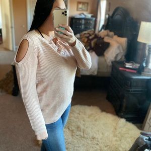 Cute and cozy baby pink cold shoulder sweater